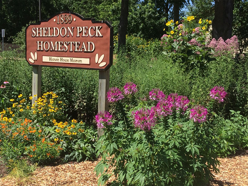 The Peck Homestead Garden sign